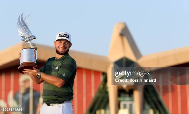 Tyrrell Hatton of England with the winners trophy after the final round of the Abu Dhabi HSBC Championship at Abu Dhabi Golf Club on January 24, 2021...