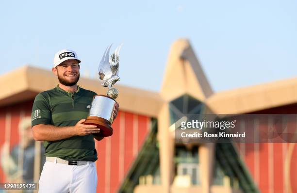 Tyrrell Hatton of England with the winners trophy after the final round of the Abu Dhabi HSBC Championship at Abu Dhabi Golf Club on January 24, 2021...