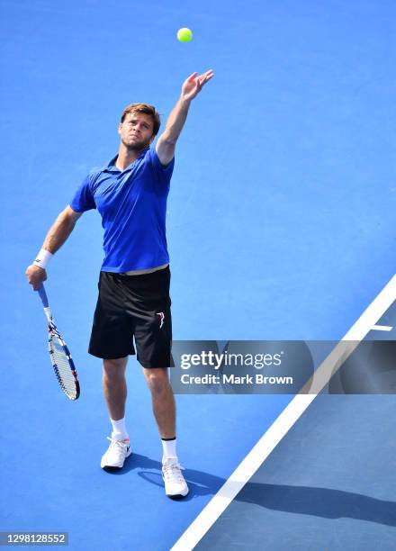 Ryan Harrison in action against Ariel Behar of Uruguay and Gonzalo Escobar of Ecuador while playing with his brother Christian Harrison during the...