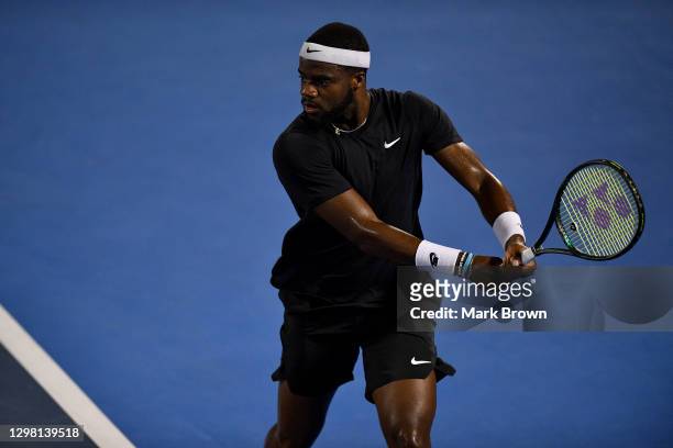 Frances Tiafoe of the USA returns the shot against Cameron Norrie of Great Britain during the Quarterfinals of the Delray Beach Open by Vitacost.com...