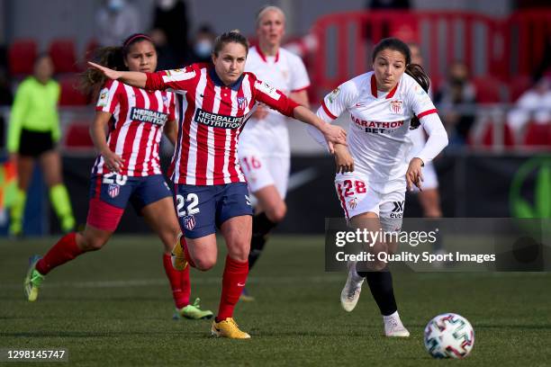 Bonetti of Atletico de Madrid Women battle for the ball with Inma Gabarro Sevilla FC Women during the Primera Division Femenina match between...