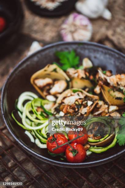 stuffed conchiglioni with spinach, cauliflower, roasted almonds and raisins - grilled vegetables stock pictures, royalty-free photos & images