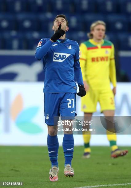 Andrej Kramaric of TSG 1899 Hoffenheim celebrates after scoring their side's first goal from the penalty spot during the Bundesliga match between TSG...