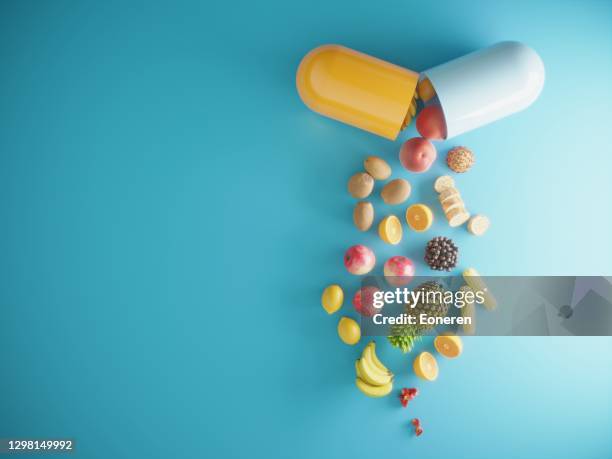 vitaminesupplementen - vitamine stockfoto's en -beelden
