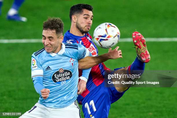 Emre Mor of Celta de Vigo competes for the ball with Rafa Soares of SD Eibar during the La Liga Santander match between RC Celta and SD Eibar at...