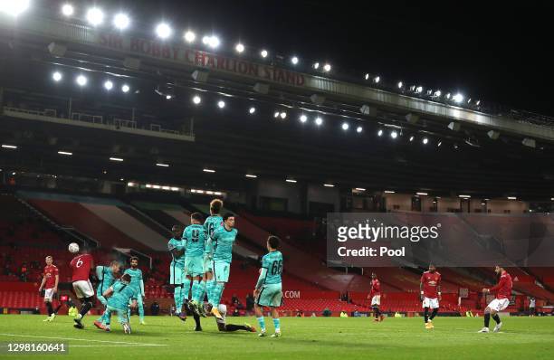 Bruno Fernandes of Manchester United scores their side's third goal from a free kick during The Emirates FA Cup Fourth Round match between Manchester...