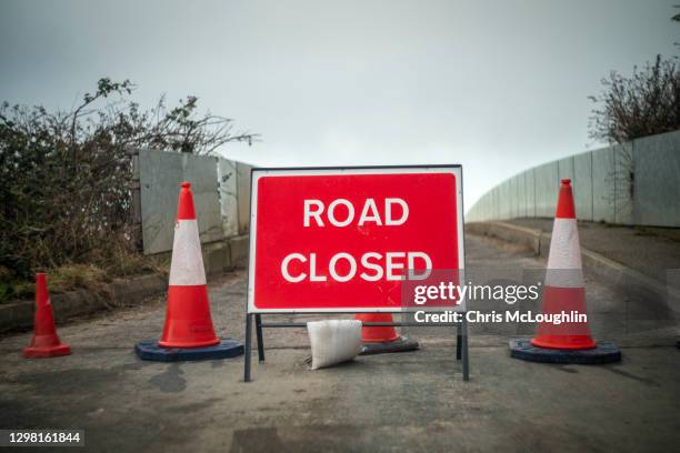 road closed sign. flooding caused from storm christoph - road closed stock pictures, royalty-free photos & images