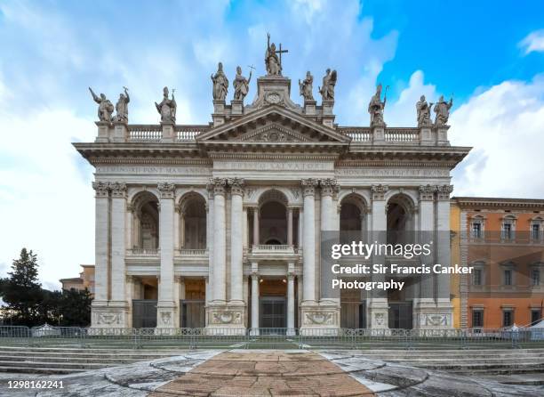 baroque facade of san giovanni in laterano basilica in rome, lazio, italy - basilica foto e immagini stock