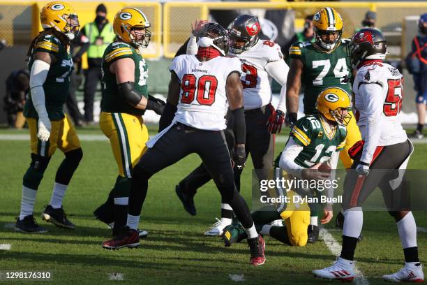 Jason Pierre-Paul of the Tampa Bay Buccaneers celebrates after sacking Aaron Rodgers of the Green Bay Packers in the first quarter during the NFC...