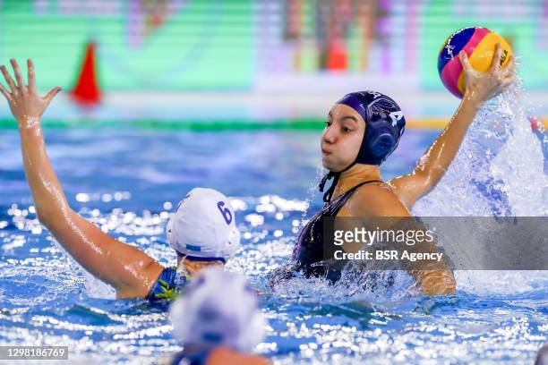 Darya Roga of Kazakhstan, "" Camelia Boulouckbachi of France during the match between Kazachstan and France at Women's Water Polo Olympic Games...