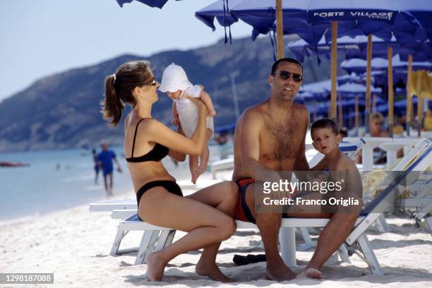 Former Italian football player Giuseppe Bergomi poses with his wife Daniela, his son Andrea Bergomi and daughter Sara Bergomi at Forte Village Resort...