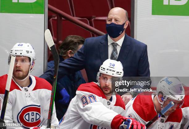 Head coach Claude Julien of the Montreal Canadiens looks on from the bench during their NHL game against the Vancouver Canucks at Rogers Arena...