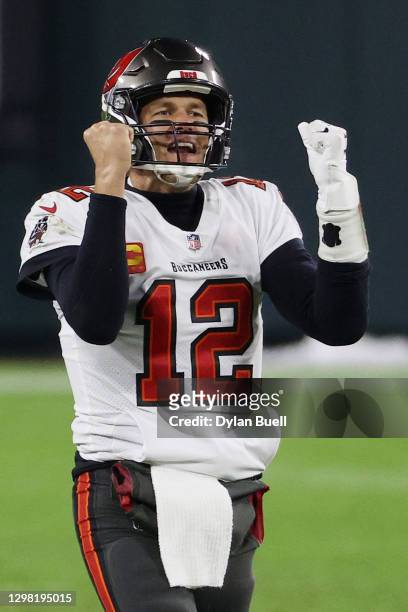 Tom Brady of the Tampa Bay Buccaneers celebrates in the final seconds of their 31 to 26 win over the Green Bay Packers during the NFC Championship...