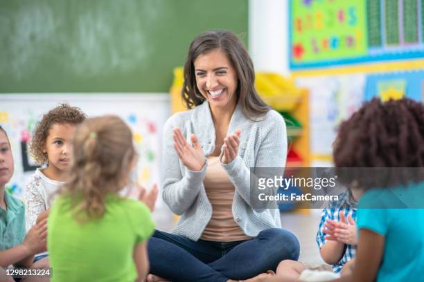 if you're happy and you know it, clap your hands - preschool stock pictures, royalty-free photos & images