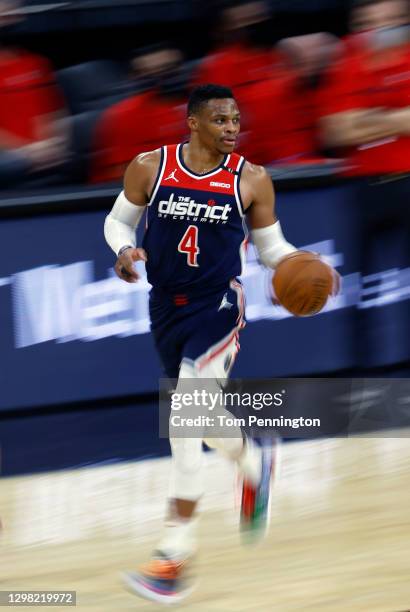 Russell Westbrook of the Washington Wizards dribbles the ball against the San Antonio Spurs in the second half at AT&T Center on January 24, 2021 in...
