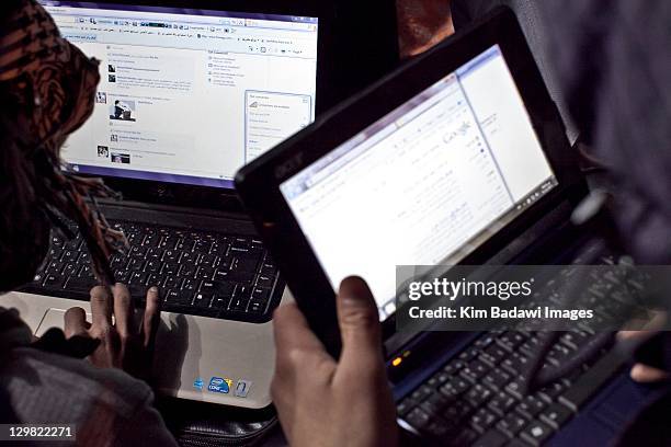 Peaceful protestors recharge their cellphones and computers at a "charging station" in Tahrir Square on February 9, 2011 in Tahrir Square in downtown...