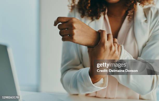 my wrist needs a bit of rest - woman arm around stock pictures, royalty-free photos & images