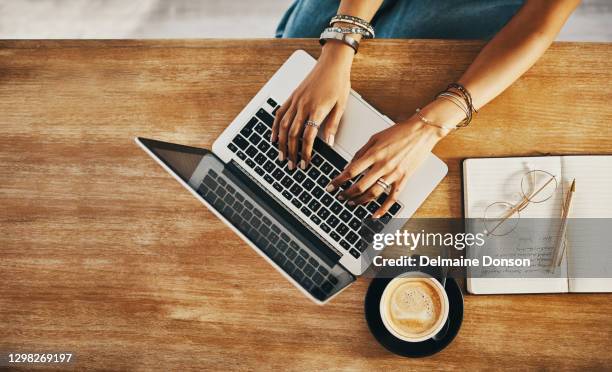 building a side business from the local cafe - working on laptop in train top view stock pictures, royalty-free photos & images