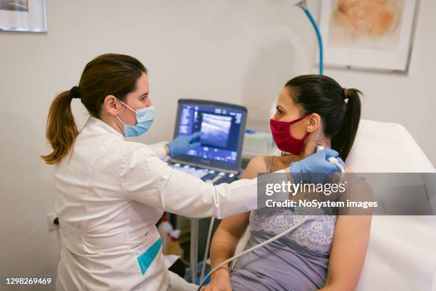 ultrasound of thyroid gland - cancer prevention stock pictures, royalty-free photos & images