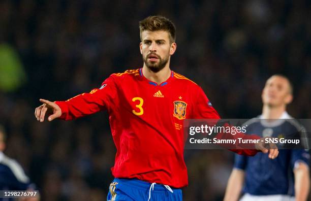 V SPAIN .HAMPDEN - GLASGOW.Gerard Pique in action for Spain