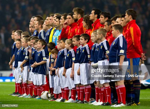 V SPAIN .HAMPDEN - GLASGOW.Scotland and Spain teams line up ahead of the match