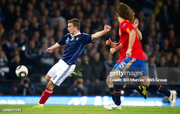 V SPAIN .HAMPDEN - GLASGOW.Scotland's James Morrison clears under pressure