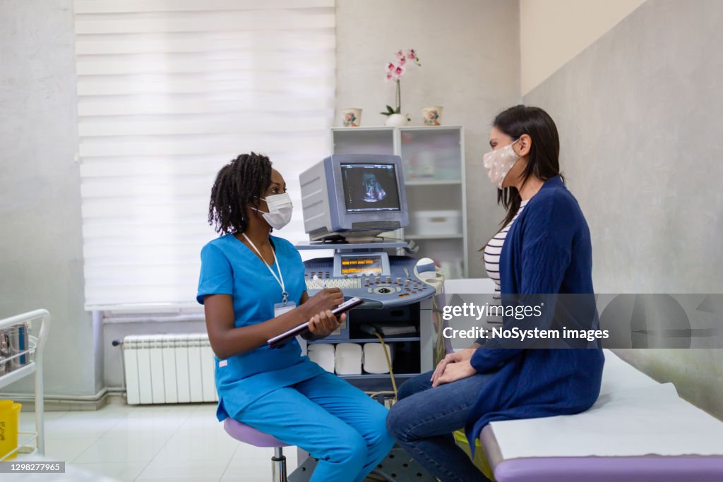 Pregnant woman on gynecological examination