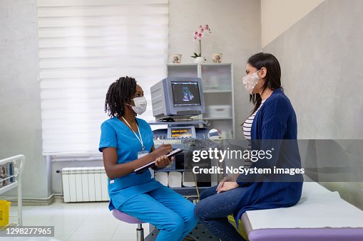 Pregnant woman on gynecological examination Pregnant woman on gynecological examination
