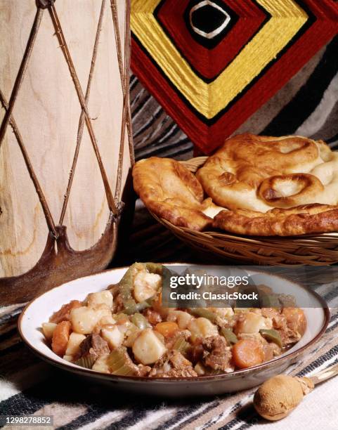 1980s Native American Traditional Food Navajo Fry Bread Vegetable And Meat Stew.