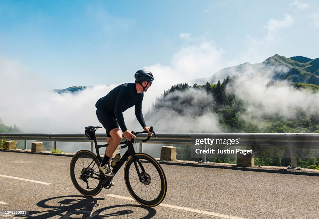 Cyclist on the Col de la Colombiere in the French Alps