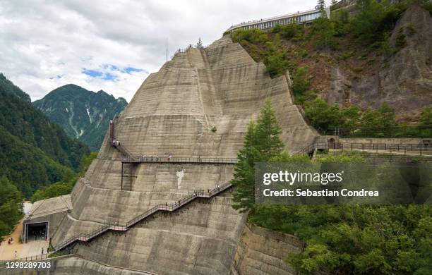 exterior stairs dam in the mountainous region tateyama kurobe alpine route ,japan. - toyama prefecture stockfoto's en -beelden