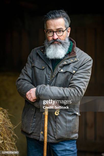 portrait of a mature man - handlebar moustache stock pictures, royalty-free photos & images