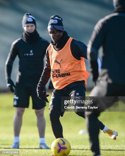 Christian Atsu controls the ball during the Newcastle United Training Session at the Newcastle United Training Centre on January 25, 2021 in...