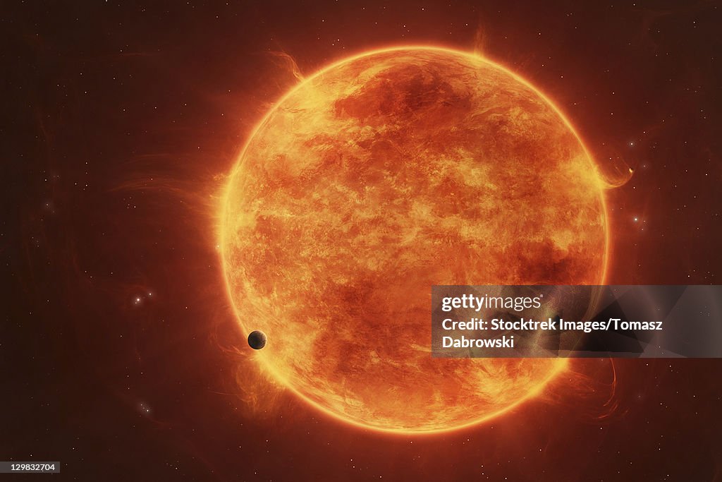 A massive red dwarf consuming planets within it's range.