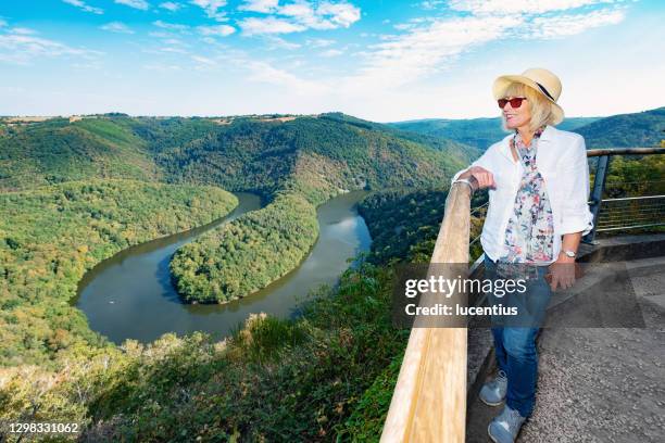 woman at meandre de queuille, auvergne, france - puy de dome photos et images de collection