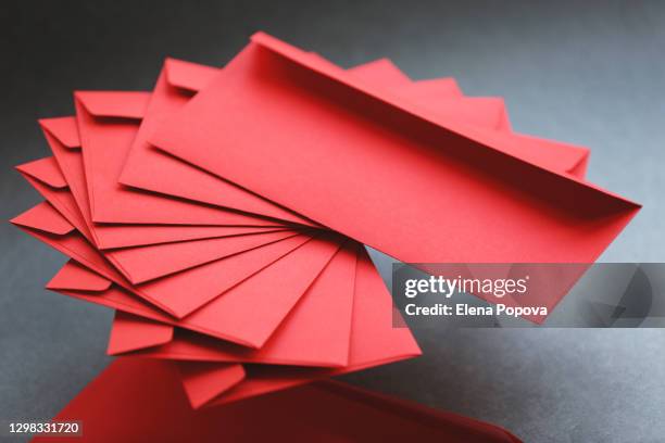 red envelopes ready to use for traditional chinese new year ceremony - chinese new year red envelope stock pictures, royalty-free photos & images