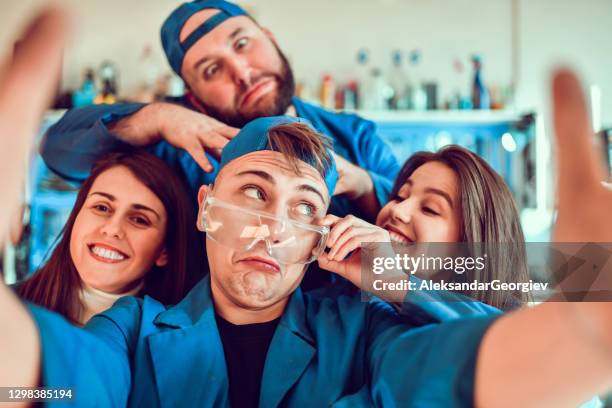 funny selfie by mechanical engineering students in workshop - funny mechanic stock pictures, royalty-free photos & images