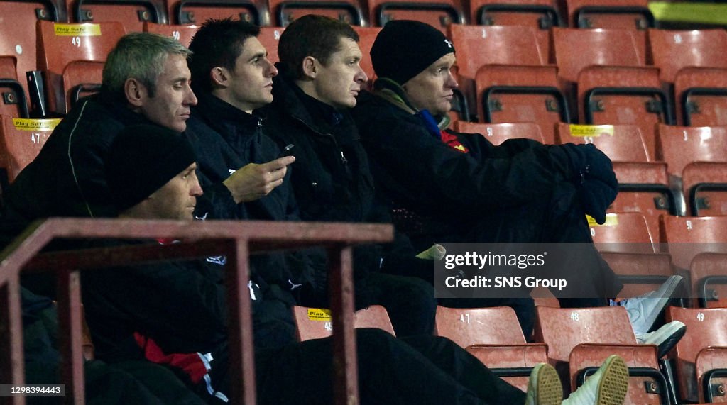 04/01/10 IRN-BRU SFL DIV 1.PARTICK THISTLE V MORTON.FIRHILL - GLASGOW.Partick Thistle's new assistant manager David Irons (left) takes in the action alongside Martyn Corrigan (2nd from right) and Partick's signing target Greg Shields (right) (Photo by