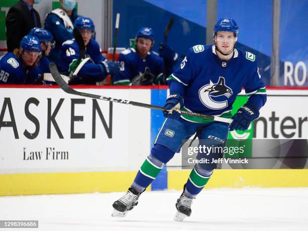 Brogan Rafferty of the Vancouver Canucks skates up ice during their NHL game against the Montreal Canadiens at Rogers Arena January 21, 2021 in...