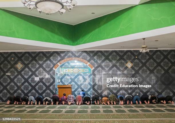 Prayer time at the local Mubarak Ahdadiyya mosque in Bandung, West Java, Indonesia.