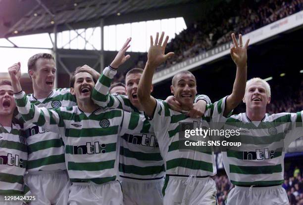 Henrik Larsson celebrates after scoring his fiftieth goal of the season for Celtic