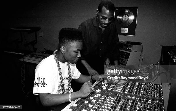 Musician and producer Fast Eddie and producer and deejay Joe Smooth mixes music at DJ International Studios in Chicago, Illinois in May 1990.