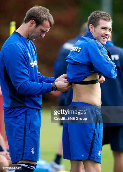 Andy Webster Shell Rangers star Andy Webster fits a hearts moniter onto youngster Jordan ...