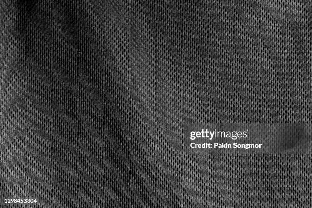 black fabric cloth polyester texture background. - grey shirt ストックフォトと画像