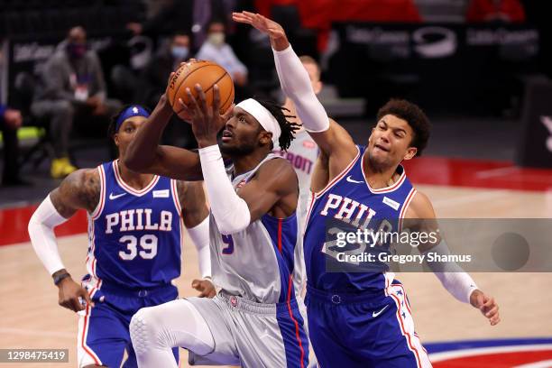 Jerami Grant of the Detroit Pistons tries to get to the basket past Matisse Thybulle of the Philadelphia 76ers during the second half at Little...