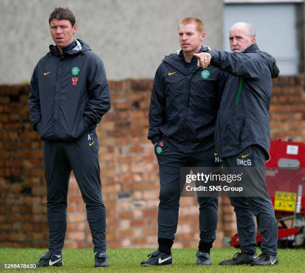 Celtic boss Neil Lennon keeps an eye on his players alongside coaches Alan Thompson and Danny McGrain