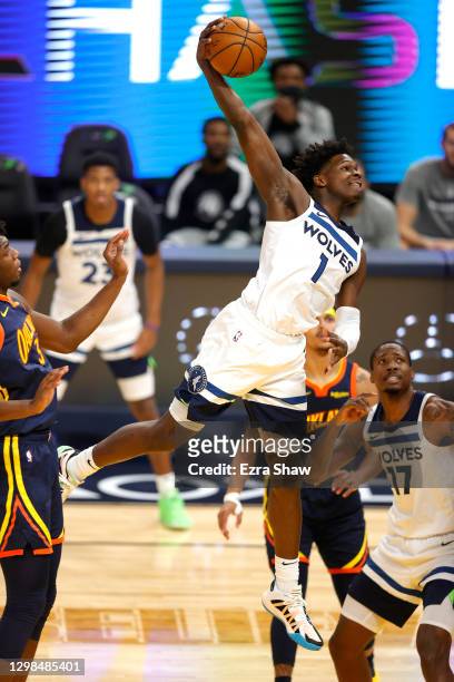 Anthony Edwards of the Minnesota Timberwolves goes up for a dunk on James Wiseman of the Golden State Warriors in the first quarter at Chase Center...