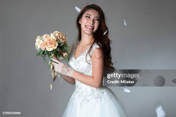 woman in a wedding dress - wedding hair stock pictures, royalty-free photos & images