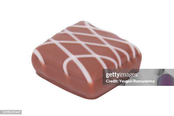 milk chocolate candy isolated on white background - candy bar display stock pictures, royalty-free photos & images