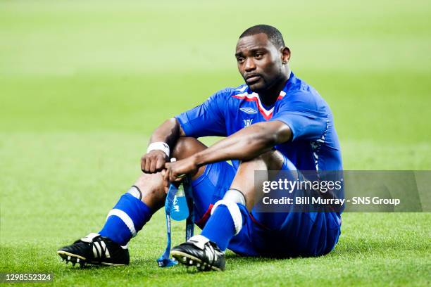 V RANGERS .CITY OF MANCHESTER STADIUM - ENGLAND.Jean Claude Darcheville knows a golden chance for European glory has gone as Rangers lose out in the...